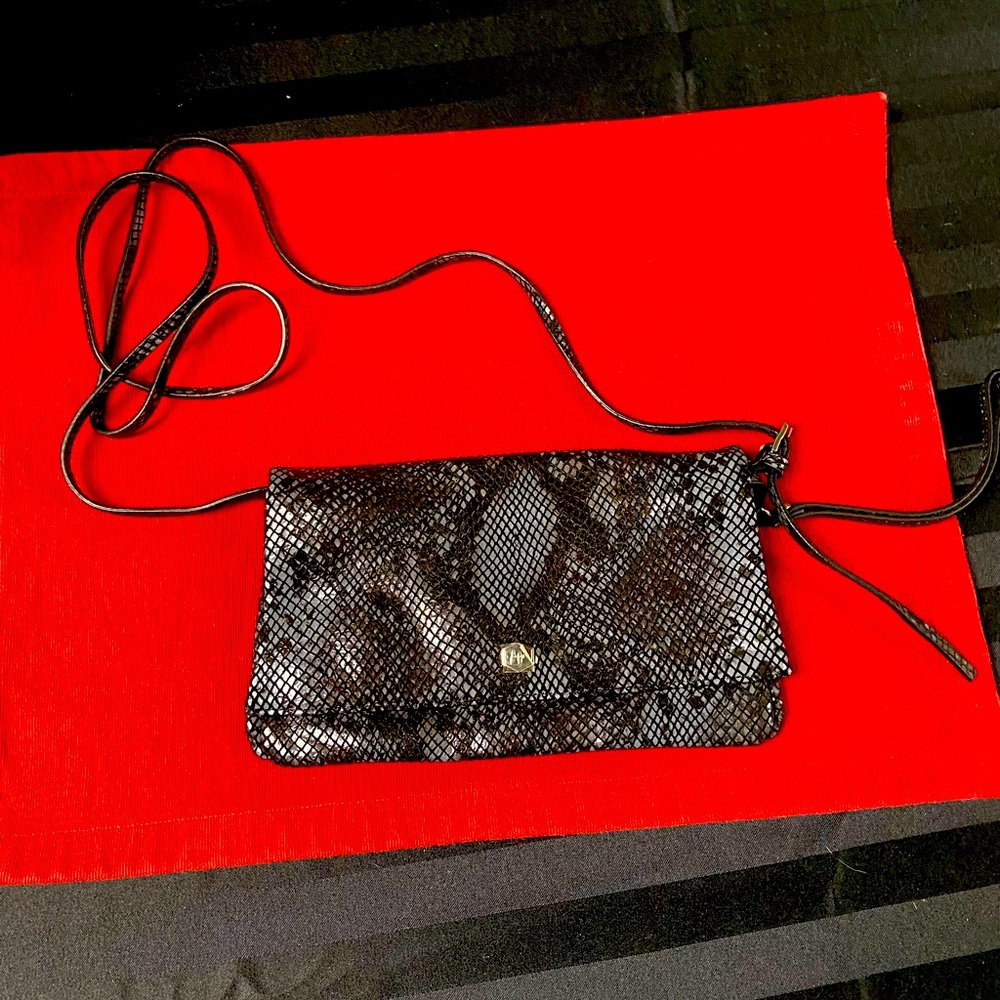 Lodi’s crossbody snakeskin leather purse